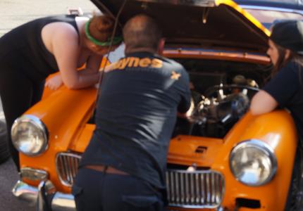 People working on the mg midget